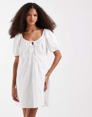Robe courte tendance folk en broderie anglaise de coton avec manches bouffantes - Blanc S