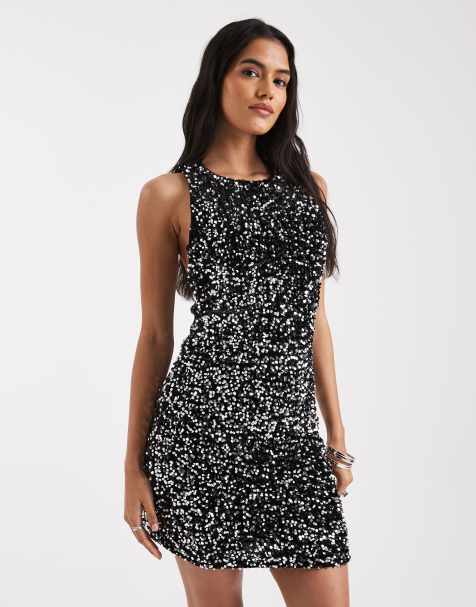 Vero Moda - Robe courte texturée à sequins avec détail nœud au dos - Noir et argenté - view 1