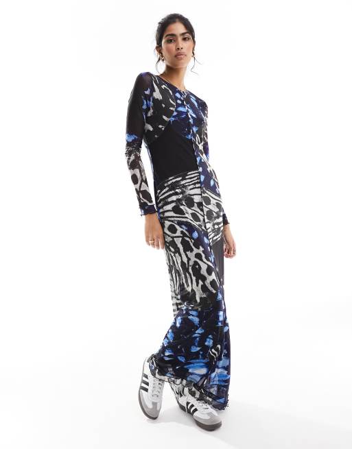 Vero Moda - Robe longue en tulle imprimé papillons abstrait avec bords ondulés et manches longues - Bleu