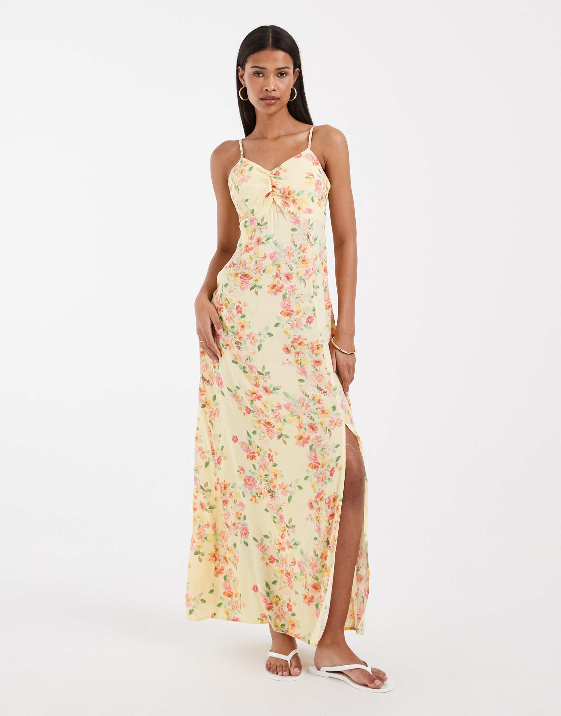vero moda ruched bust detail cami midi dress in yellow based floral print