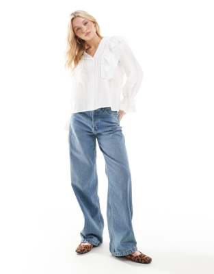 Shop Vero Moda Ruffle Blouse With Tie Sleeves In White