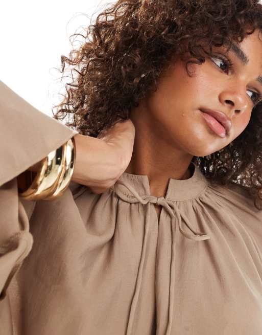 Vero Moda ruffle tiered sleeve boho top in mink