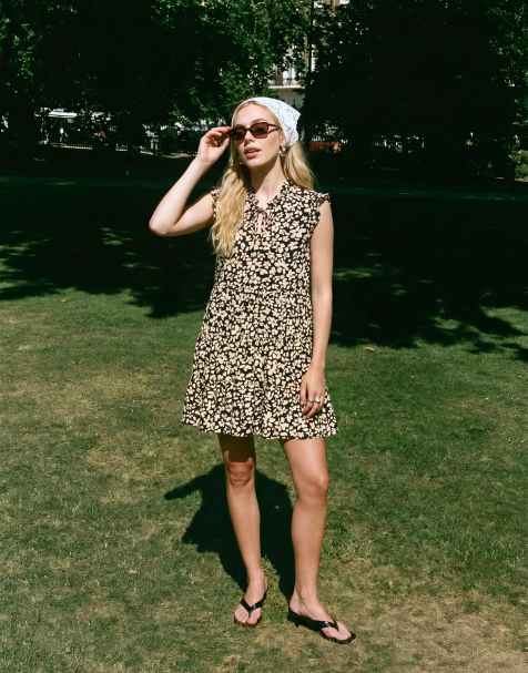 Vero Moda ruffle trim babydoll mini dress in black and white floral print - view 1
