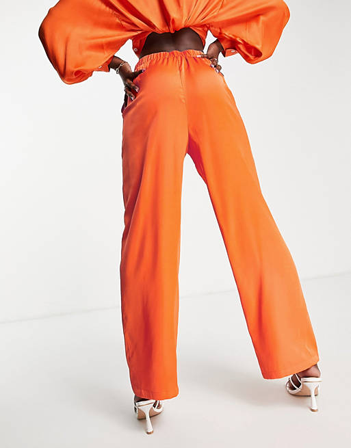 Vero Moda – Satin-Hose mit weitem Bein in leuchtendem Orange, Kombiteil |  ASOS