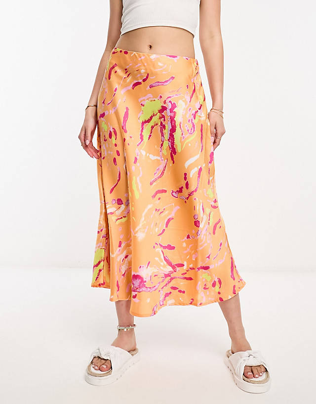 Vero Moda - satin midi skirt in orange abstract print