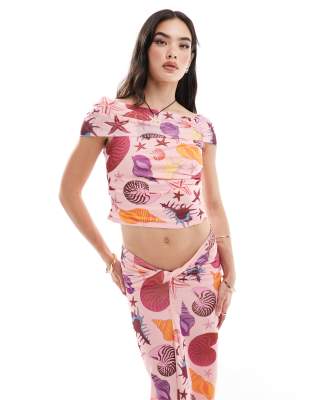 Vero Moda - Schulterfreies Netz-Oberteil in Rosa mit Muschelprint, Kombiteil