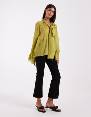 Vero Moda Sculpting Stretch High Waist Pleat Front Flare Pants In Black