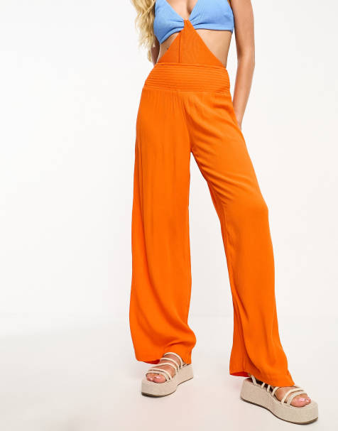 ASOS DESIGN relaxed wide leg flare pants in orange