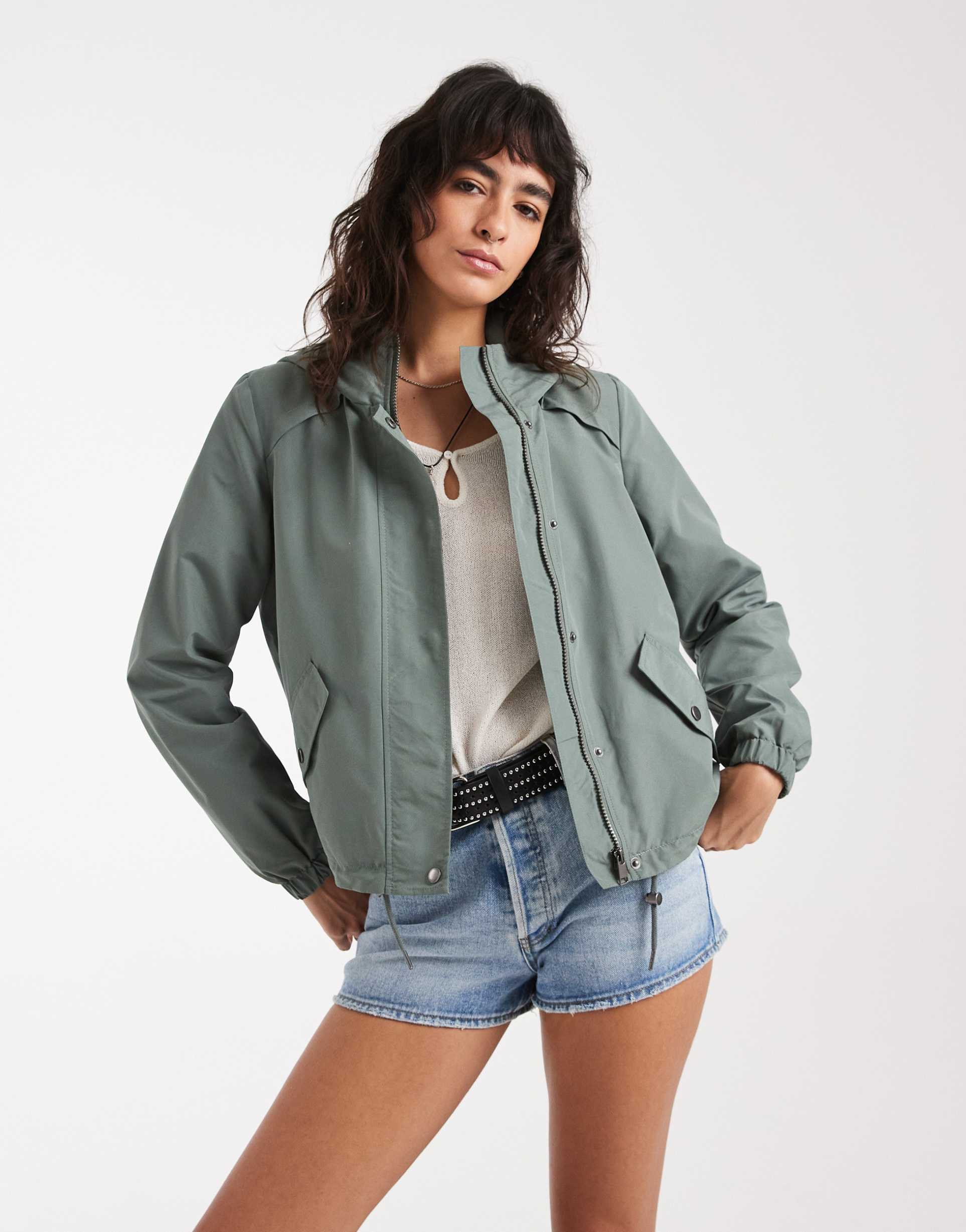vero moda short festival rain coat with hood and drawstring hem in laurel green
