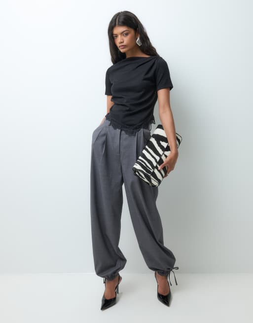 Vero Moda short sleeve boat neck asymmetric top with lace detail in black, 2 of 5