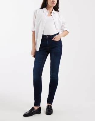Vero Moda - Skinny-Jeans aus dunkelblauem Denim mit mittelhohem Bund-Marineblau