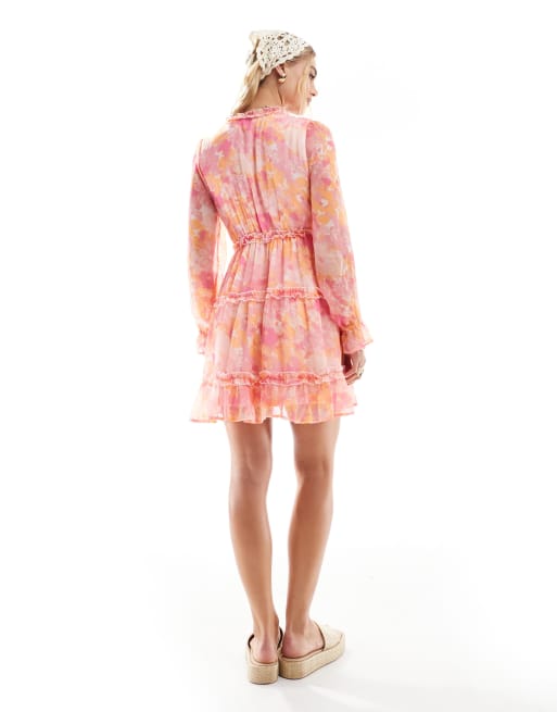 Vero Moda Smilla smock mini dress with ruffles in pink blurred floral