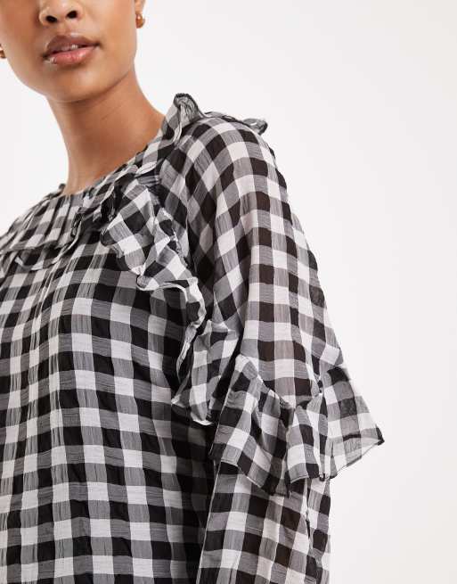Vero Moda - Sort og hvid minikjole med lange ærmer, flæsedetalje og gingham-tern, 3 af 4