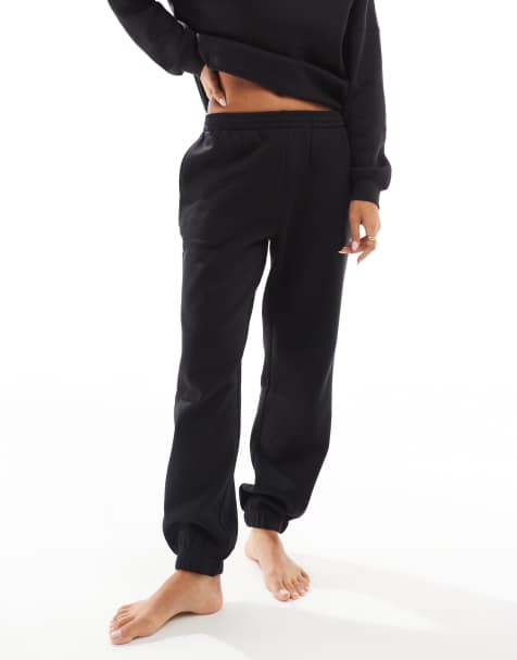 Vero Moda - Sorte oversized joggingbukser med tætsiddende buksekanter - view 1