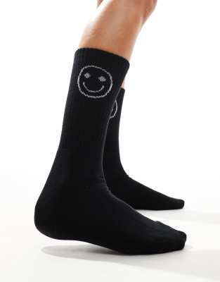 Vero Moda - Sportliche, gerippte Socken in Schwarz mit Smiley-Motiv