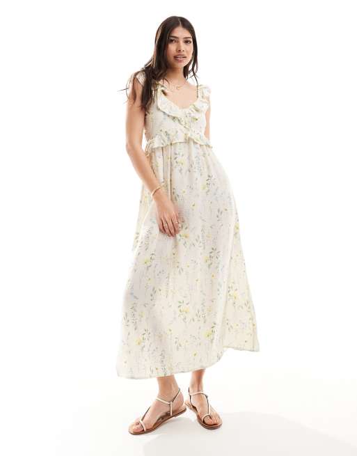 Vero Moda – Sukienka maxi z falbankami i dekoltem w szpic w delikatny kwiatowy wzór