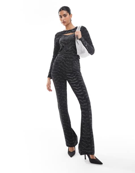 Vero Moda – Svart och silverglittrigt set med långärmad topp med utskurna detaljer, och utsvängda byxor - view 1