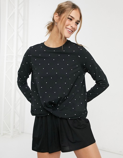 Vero Moda sweatshirt with twist detail in black spot print