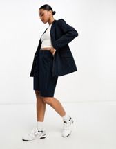 Vero Moda Curve tailored suit shorts co-ord in blue | ASOS