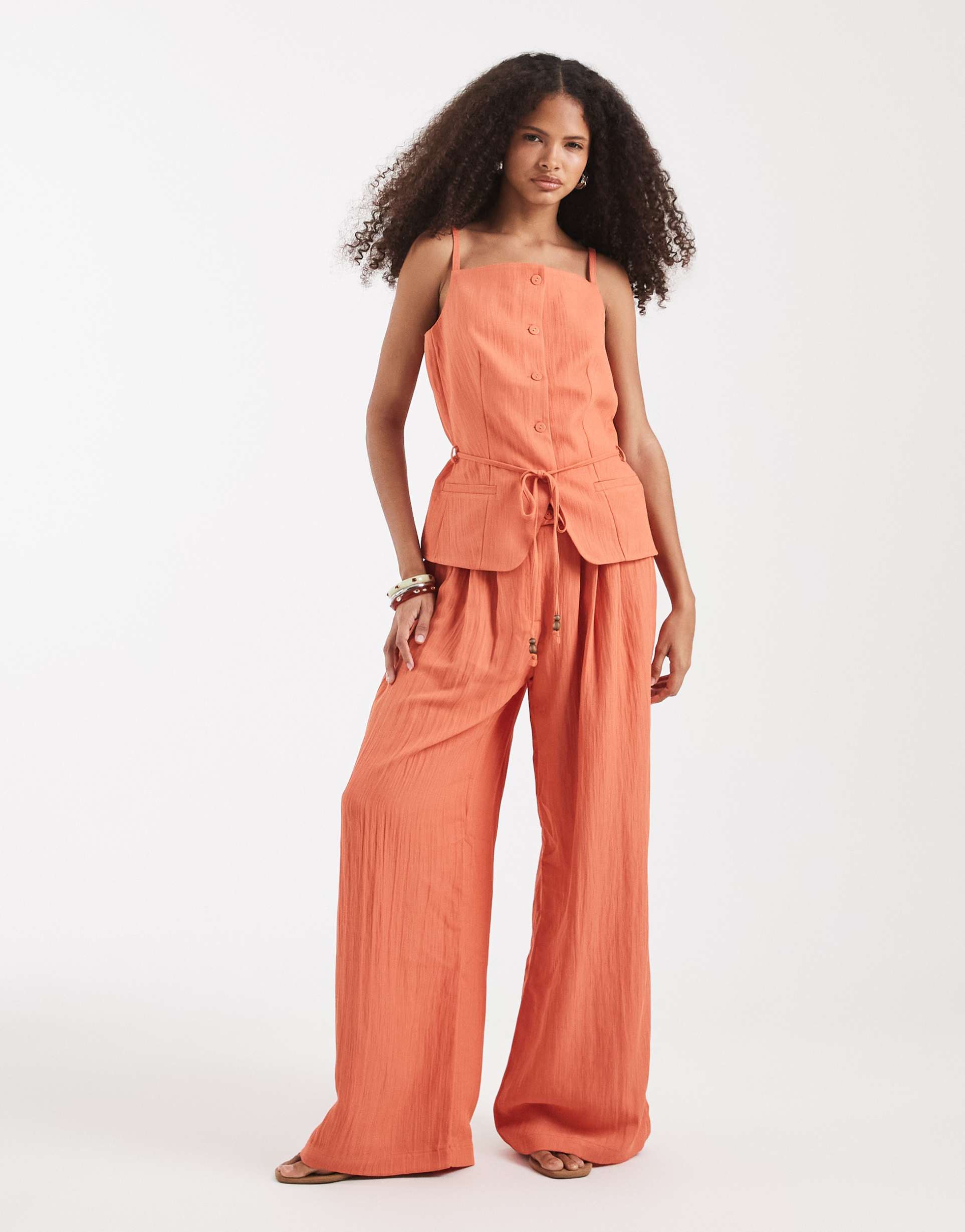 vero moda tailored pleated wide leg pants in orange - part of a set