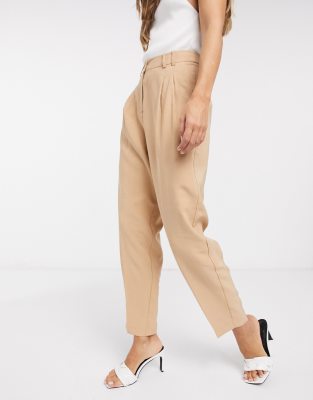 beige tapered trousers