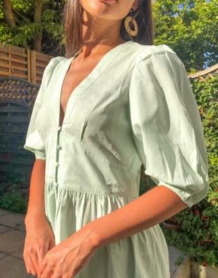 light green dress with puff sleeves