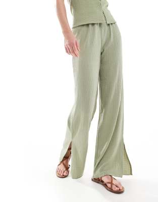 Shop Vero Moda Tall Textured Jersey Slit Leg Pants In Green