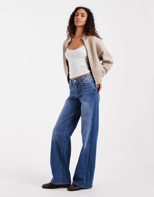 Vero Moda Tall - Vaqueros elásticos de pernera ancha y talle medio Sandie en denim azul medio, 2 de 5