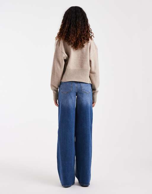 Vero Moda Tall - Vaqueros elásticos de pernera ancha y talle medio Sandie en denim azul medio, 3 de 5