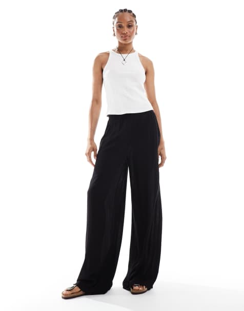 Vero Moda Tall high waisted floaty wide leg trousers in black
