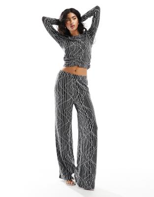 textured glitter wide leg pants in black - part of a set