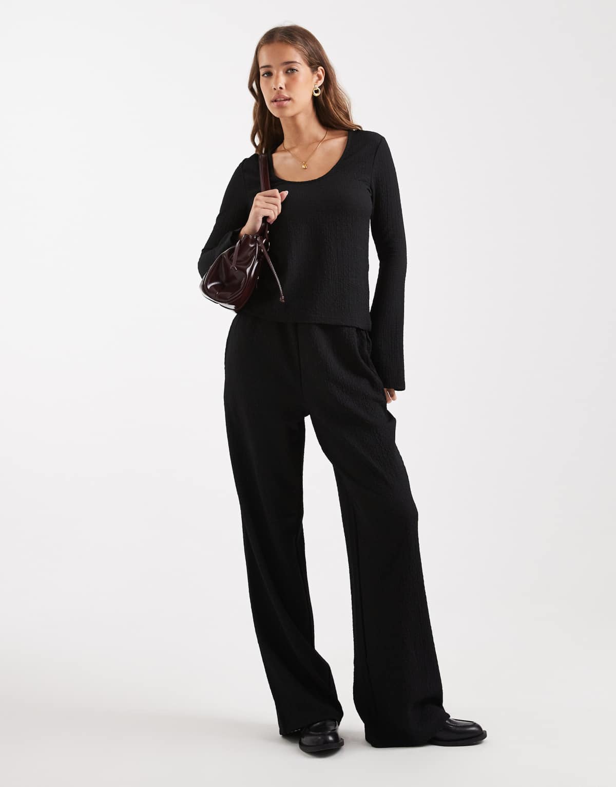 Vero Moda textured jersey bell sleeve top and pull on trouser set in black