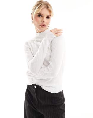 textured long sleeve top with lettuce contrast edge in white