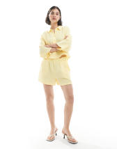 textured shorts in pale yellow - part of a set