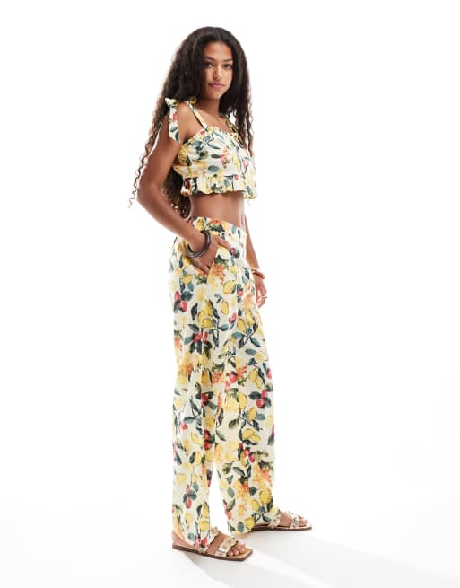Vero Moda tie shoulder ruffle crop top and wide leg trousers set in summer fruit print