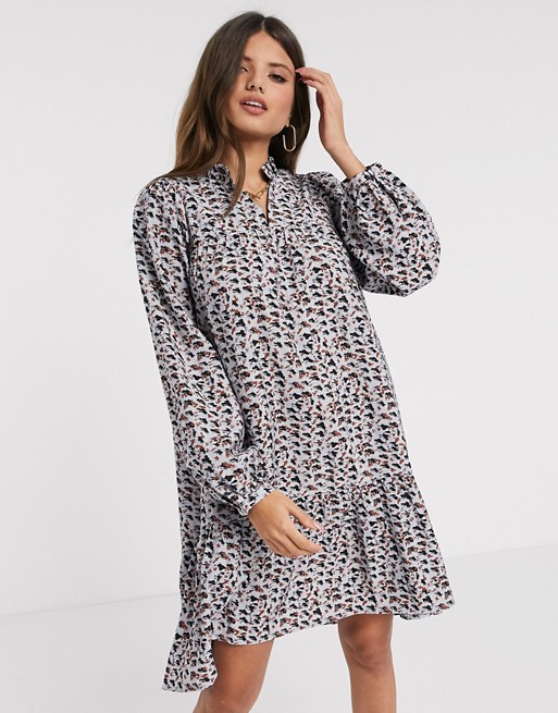 Vero Moda tiered smock dress with volume sleeve in blue abstract print