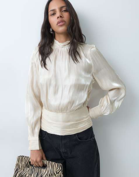 Vero Moda top de cuello alto, manga larga y volantes en champagne - view 1