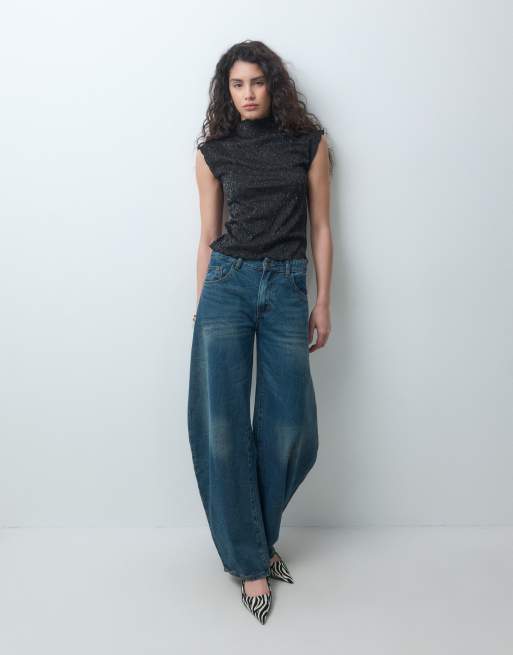 Vero Moda top de manga de casquillo con cuello alto falso y brillo en negro, 3 de 4