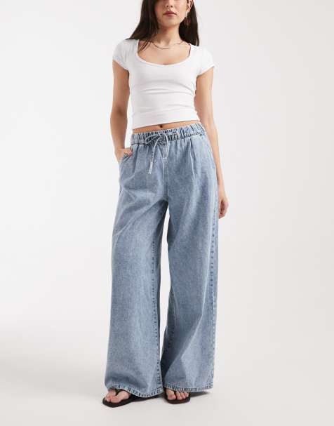 Vero Moda - Valeria - Jeans met halfhoge elastische taille en wijde pijpen in lichtblauwe wassing - view 1