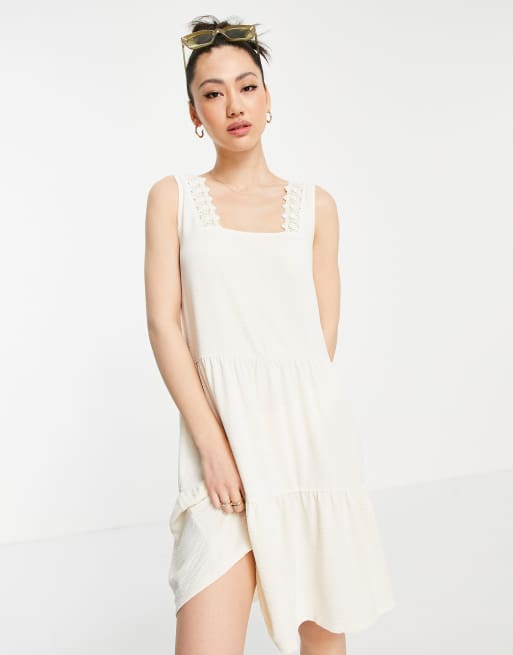 Vero Moda - Vestito corto a balze con finiture in pizzo color crema, 1 di 4