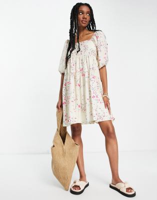 Vero Moda - Vestito grembiule corto aperto sul retro, colore crema a fiori