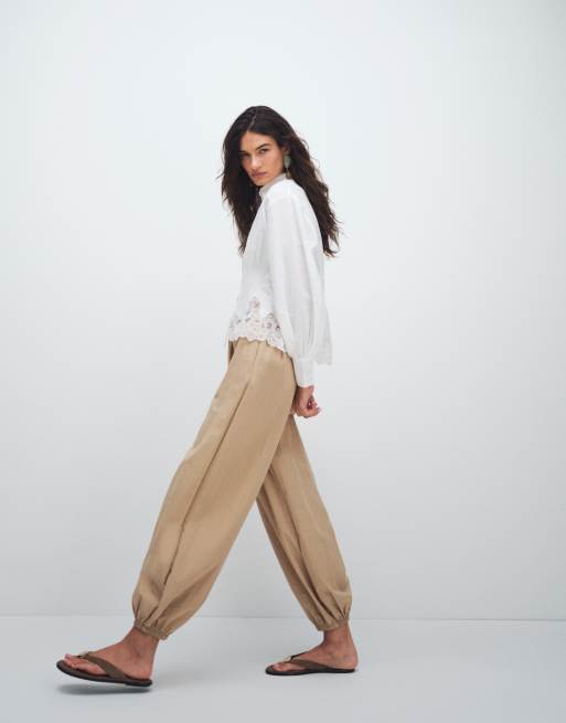 Vero Moda - Volumineuze broek met ballonpijpen en elastische taille in beige, 5 van 7