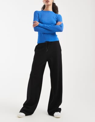 Vero Moda - Weit geschnittene Jersey-Schlupfhose in Schwarz mit geschnürter Taille