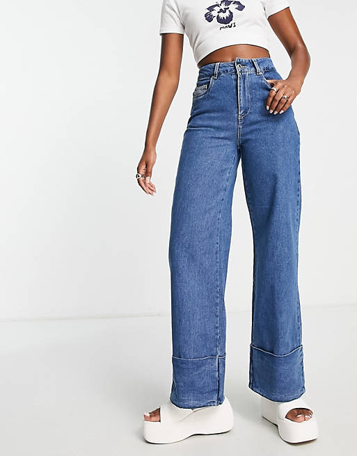 Vero Moda wide leg jeans with high turn up in mid blue wash