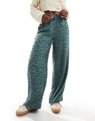 wide leg tie waist pants with textured applique in green