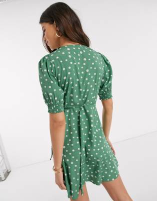 green polka dot puff sleeve dress