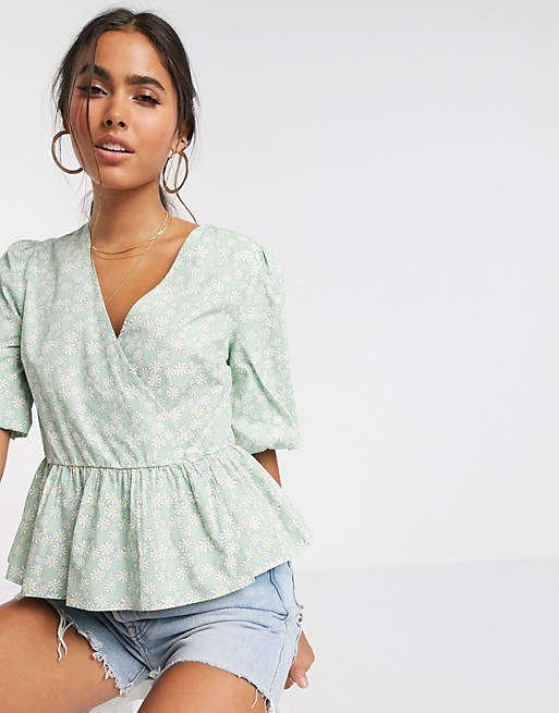 Vero Moda wrap top with peplum and puff sleeves in green daisy print