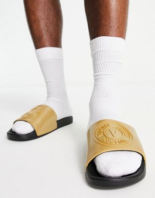 Versace Jeans Couture emblem sliders in gold