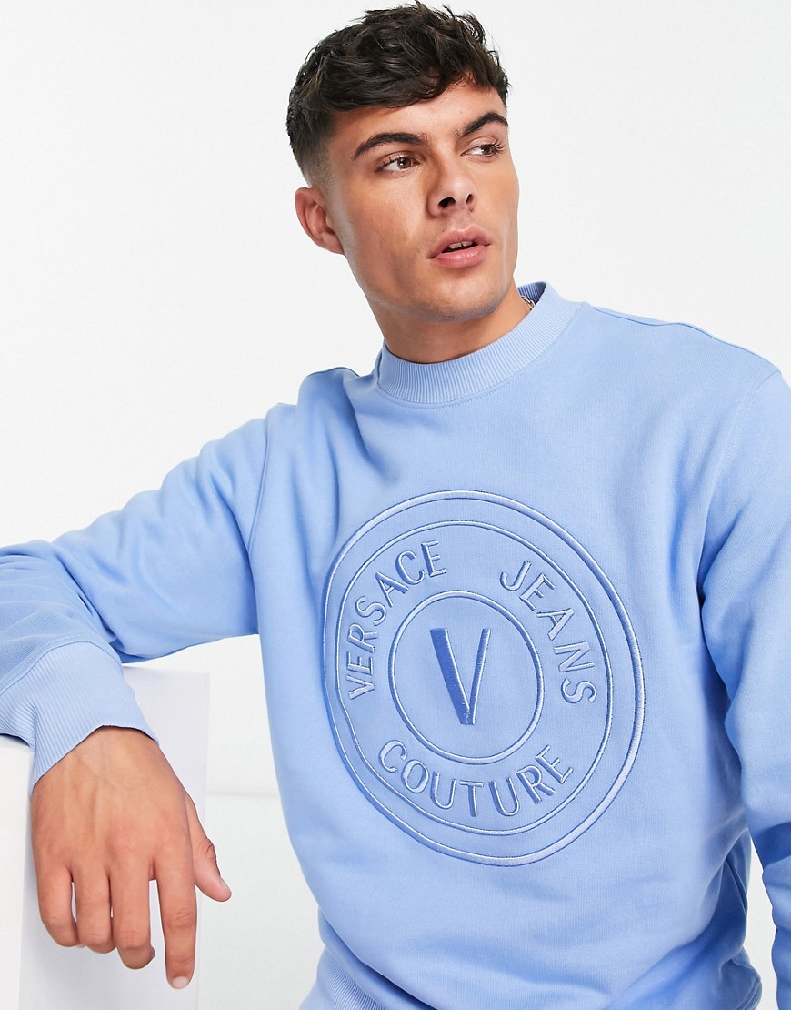 versace jeans couture embroidered emblem sweatshirt in blue-black
