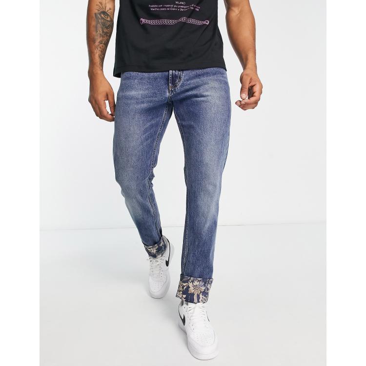 Versace Jeans Couture - Jeans blu con toppe stile barocco